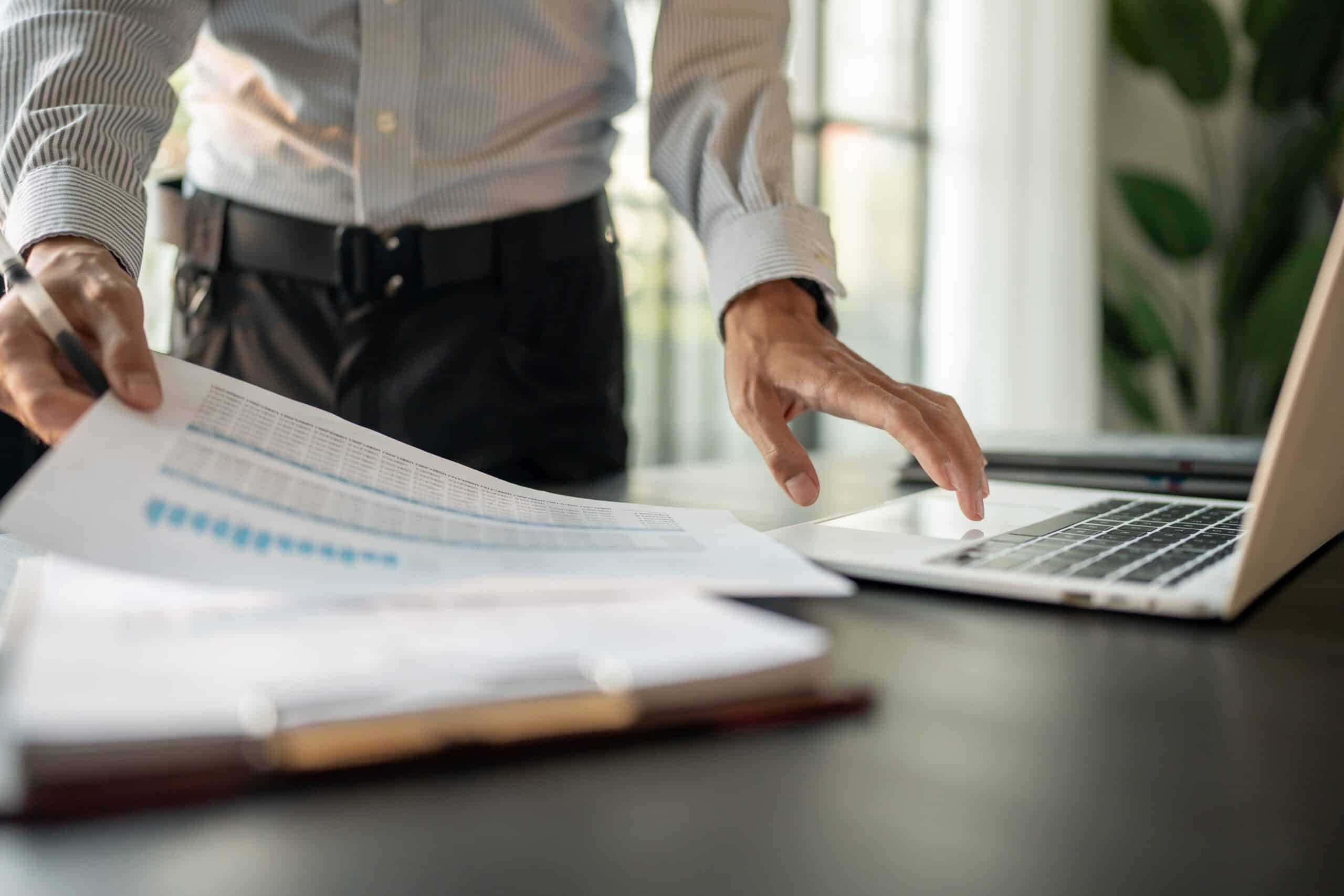 Businessman,Accountant,Analyzing,Investment,Charts,Invo &ndash; Ecora